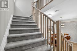 Wide stairways to 2nd lev -