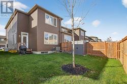 Backyard space partially fenced -