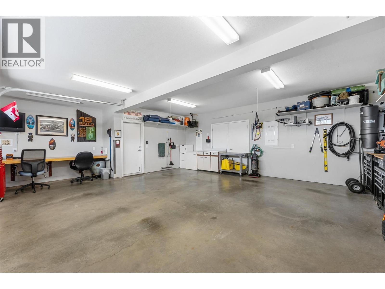 Oversize, Heated Garage - 2600 Paramount Drive, West Kelowna, BC - Indoor Photo Showing Garage