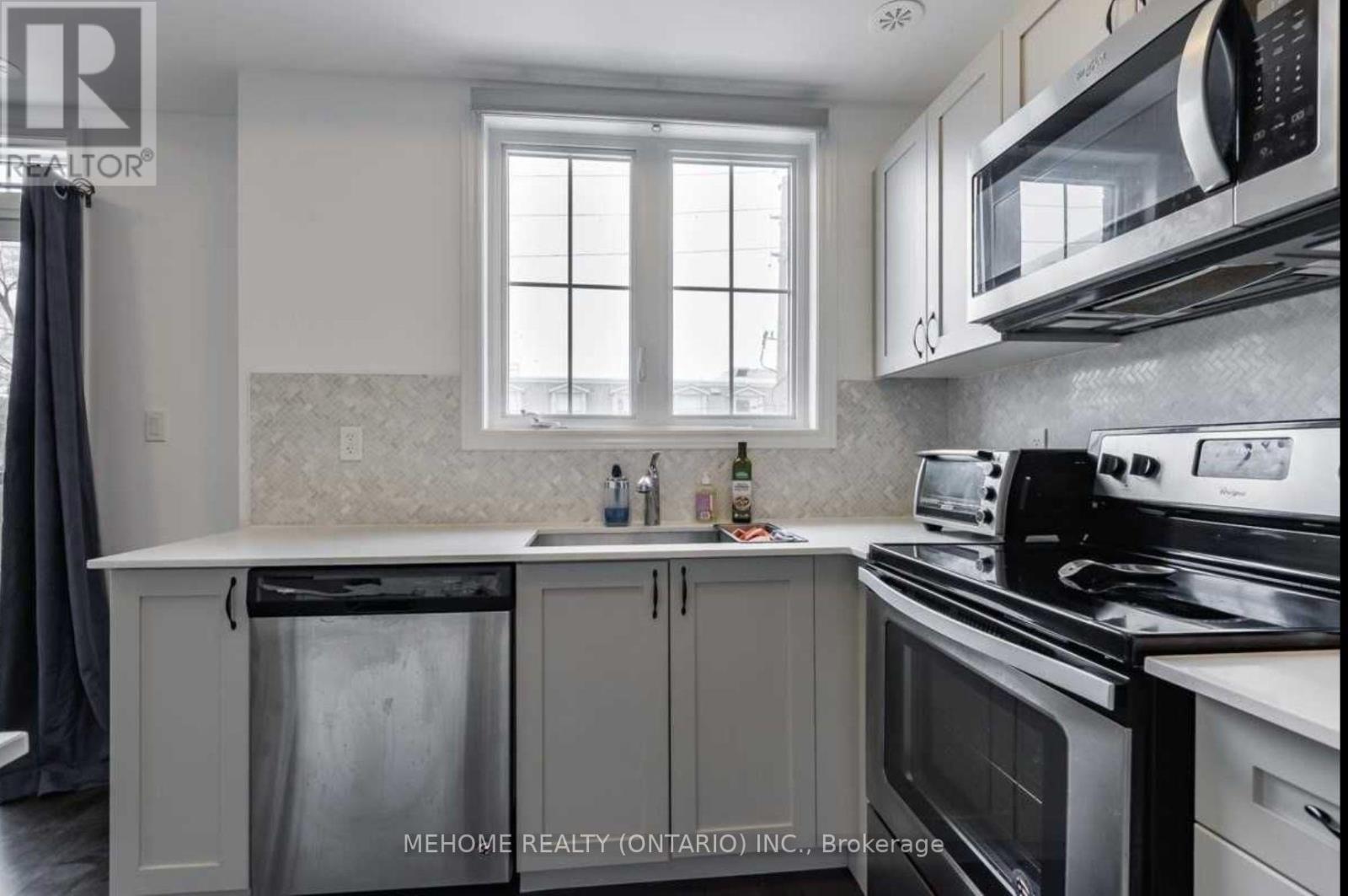 319 - 199 Pine Grove Road, Vaughan, ON - Indoor Photo Showing Kitchen