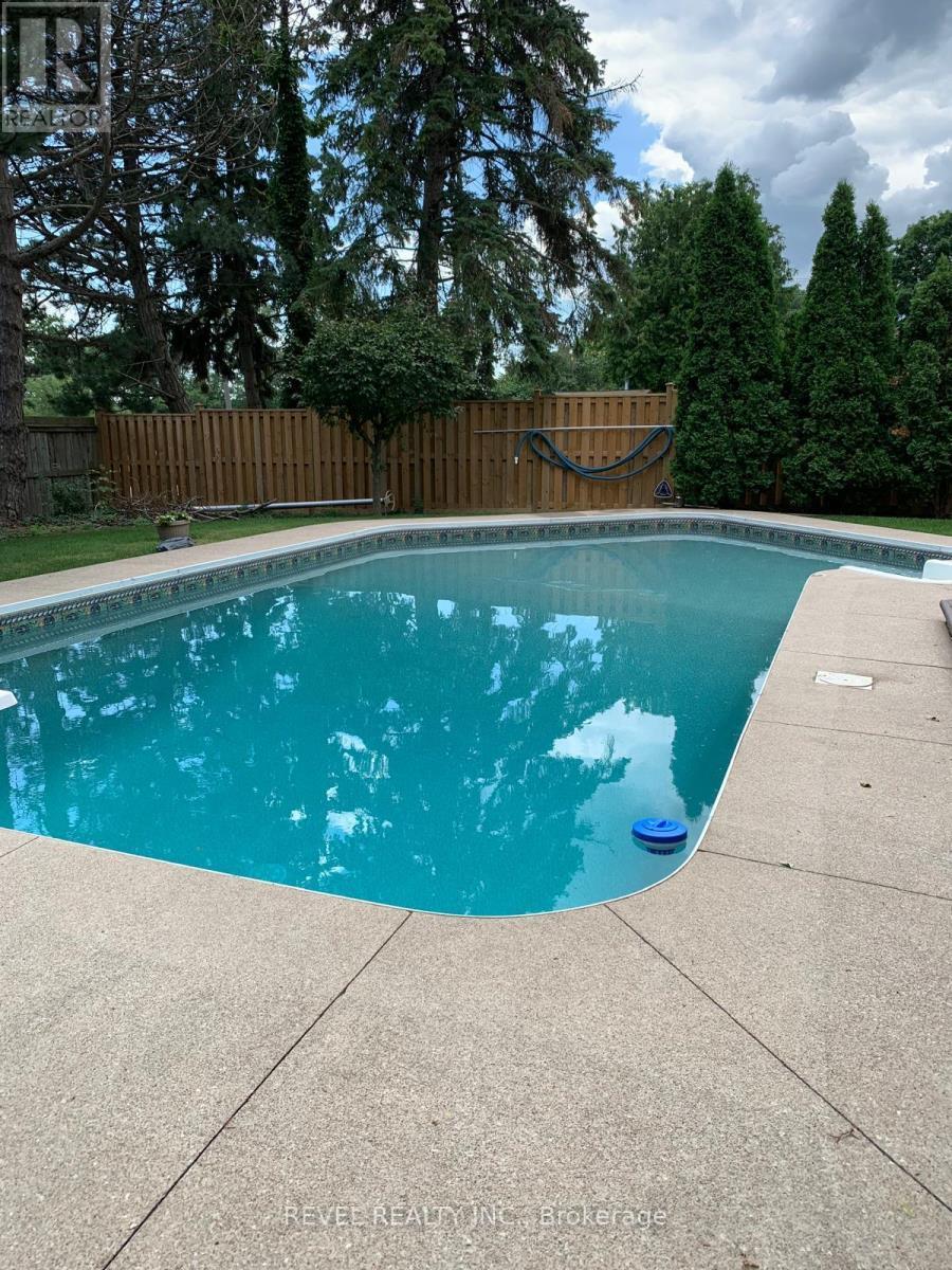 1034 Fredonia Drive, Mississauga, ON - Outdoor With In Ground Pool With Backyard