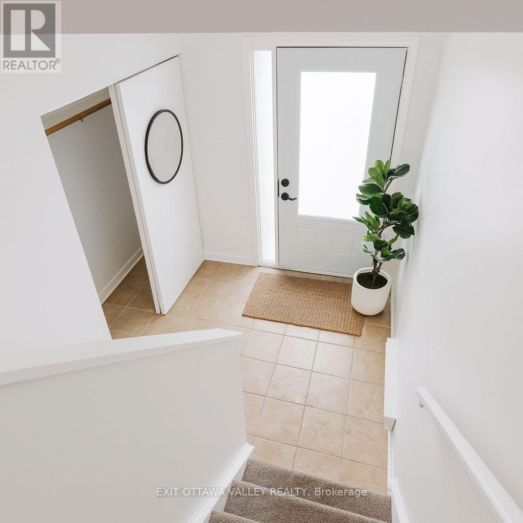 Virtually staged entrance - 3 - 10 Charles Street, Arnprior, ON - Indoor Photo Showing Other Room