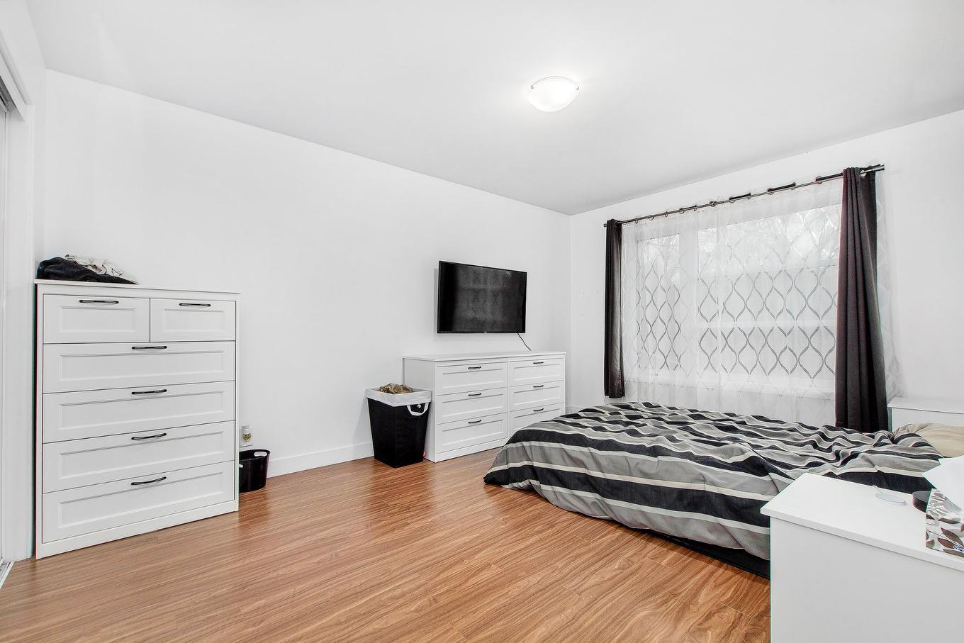 Primary bedroom - 1408 - 1410 Rue Poirier, Mascouche, QC - Indoor Photo Showing Bedroom