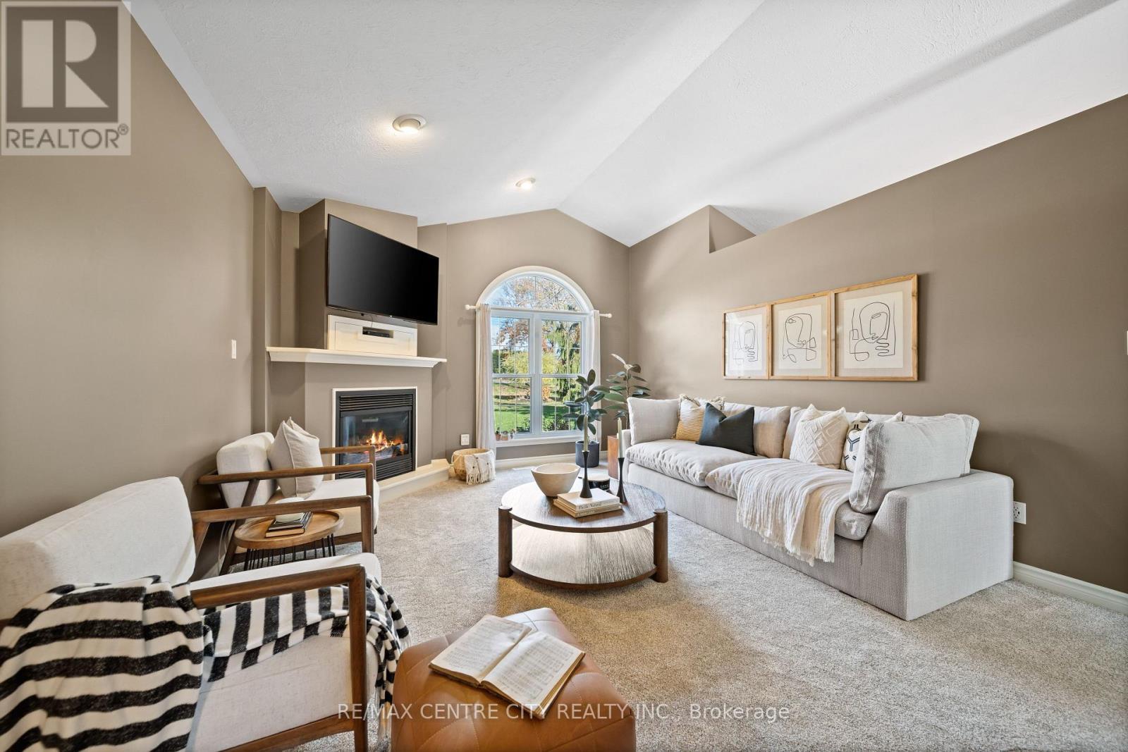 Cozy living - 50015 John Wise Line, Malahide, ON - Indoor Photo Showing Living Room With Fireplace