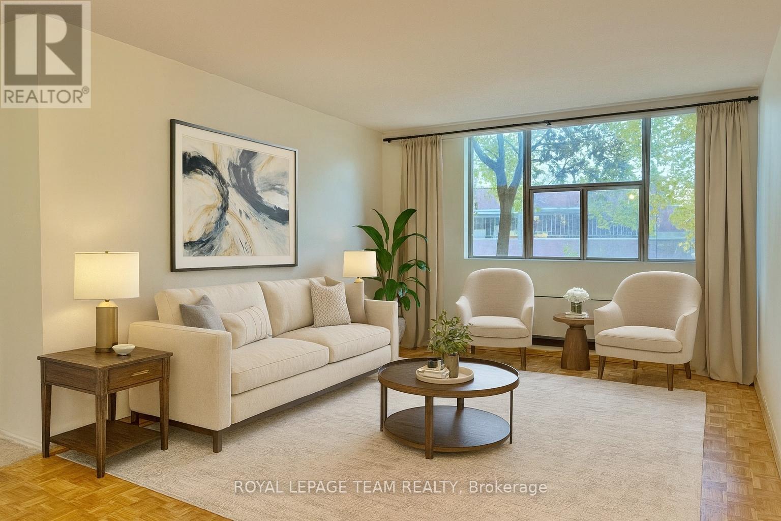 Great Room staged - 102 - 2760 Carousel Crescent, Ottawa, ON - Indoor Photo Showing Living Room