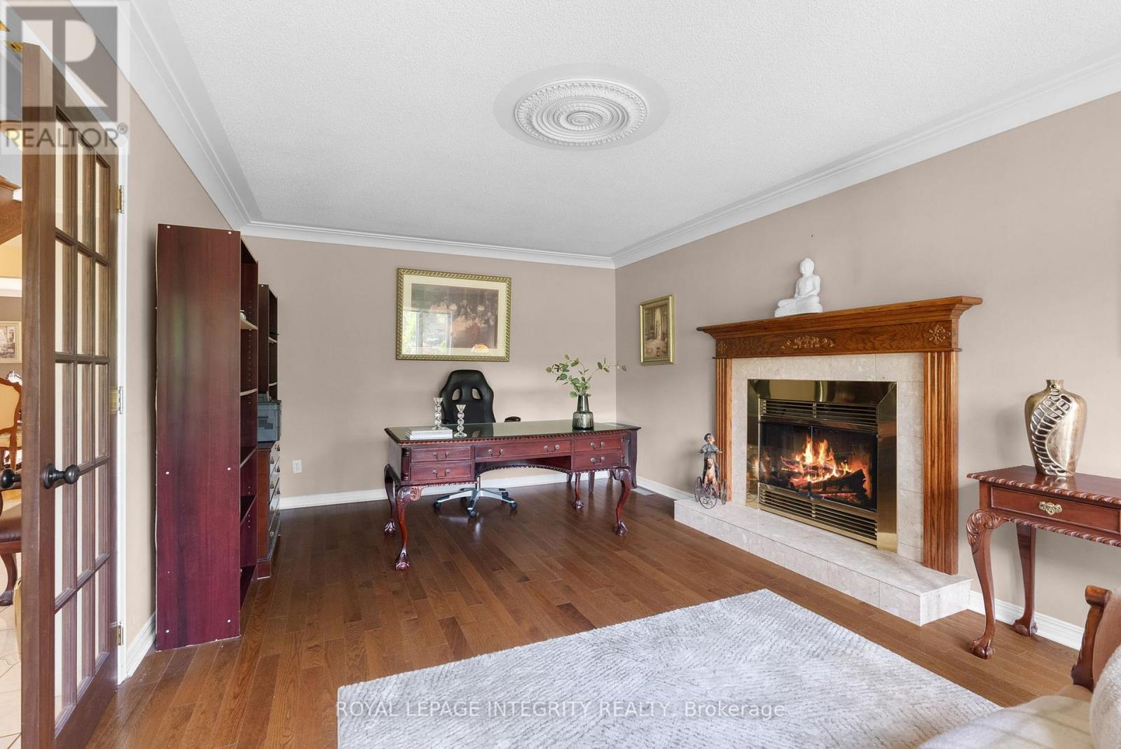 22 Marchbrook Circle, Ottawa, ON - Indoor Photo Showing Living Room With Fireplace