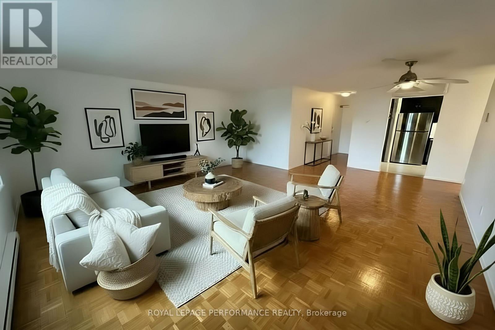 this photograph is virtually staged. - 308 - 475 Laurier Avenue W, Ottawa, ON - Indoor Photo Showing Living Room