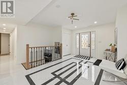 Spacious entry, LED pot lighting -