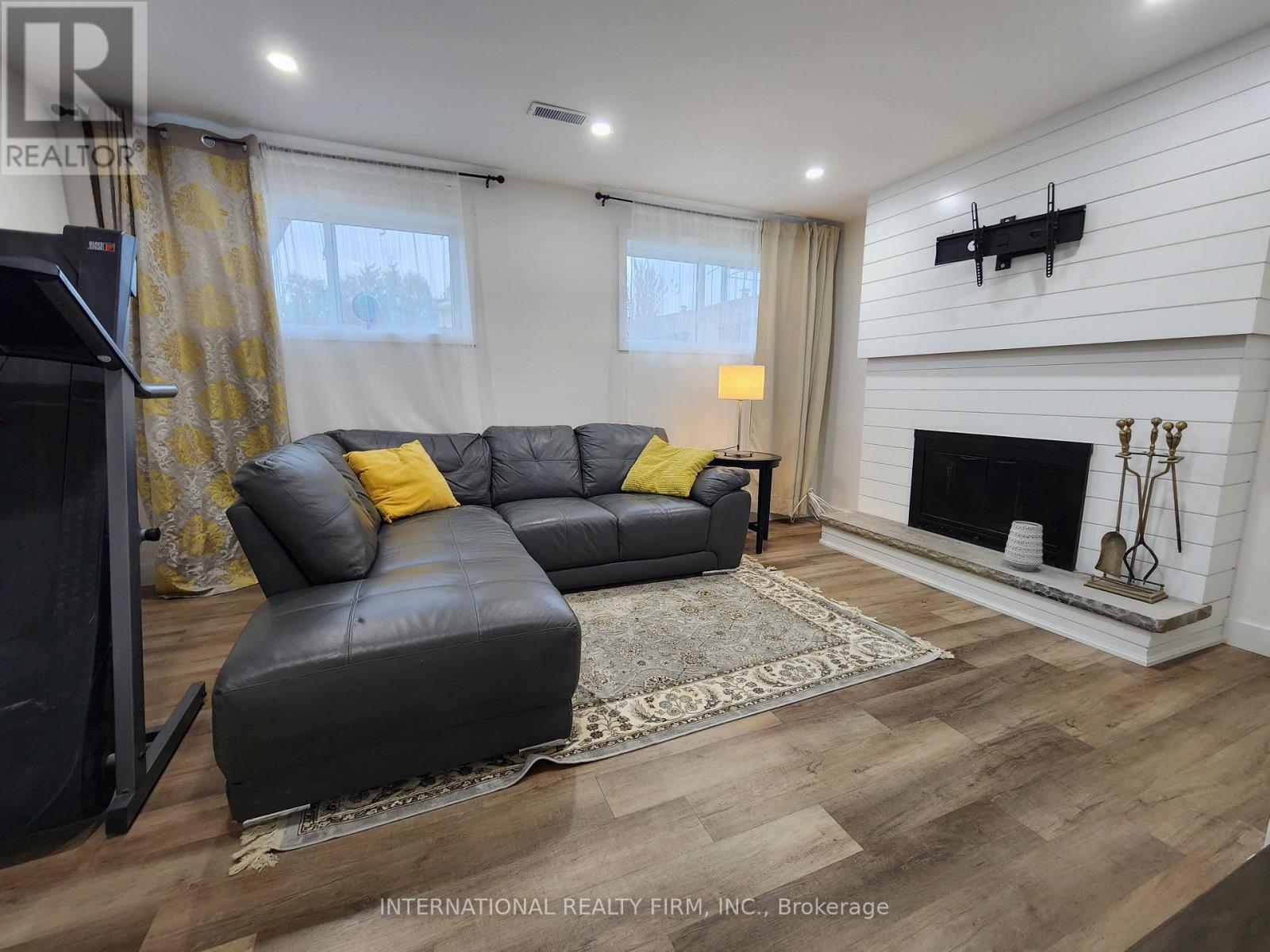 Lower - 435 Hansen Road N, Brampton, ON - Indoor Photo Showing Living Room With Fireplace