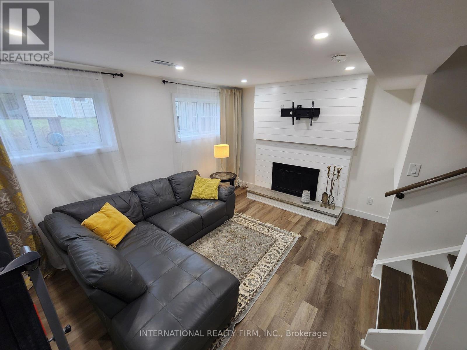 Lower - 435 Hansen Road N, Brampton, ON - Indoor Photo Showing Living Room With Fireplace