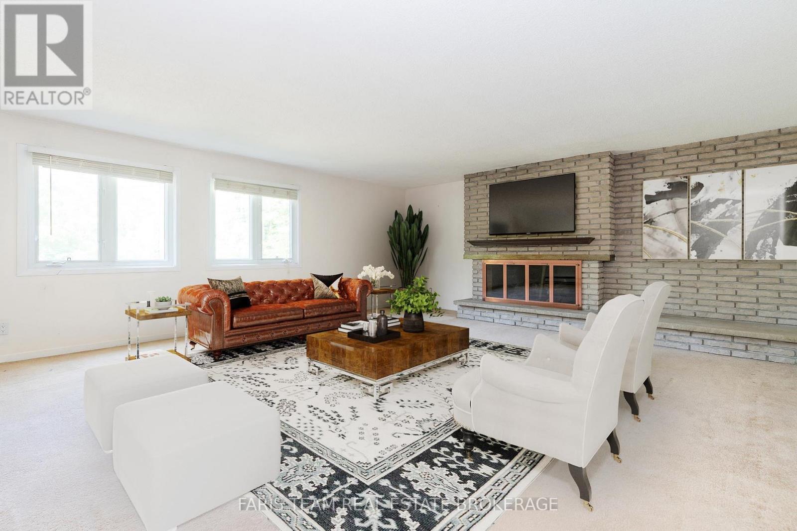 2597 George Johnston Road, Springwater, ON - Indoor Photo Showing Living Room With Fireplace