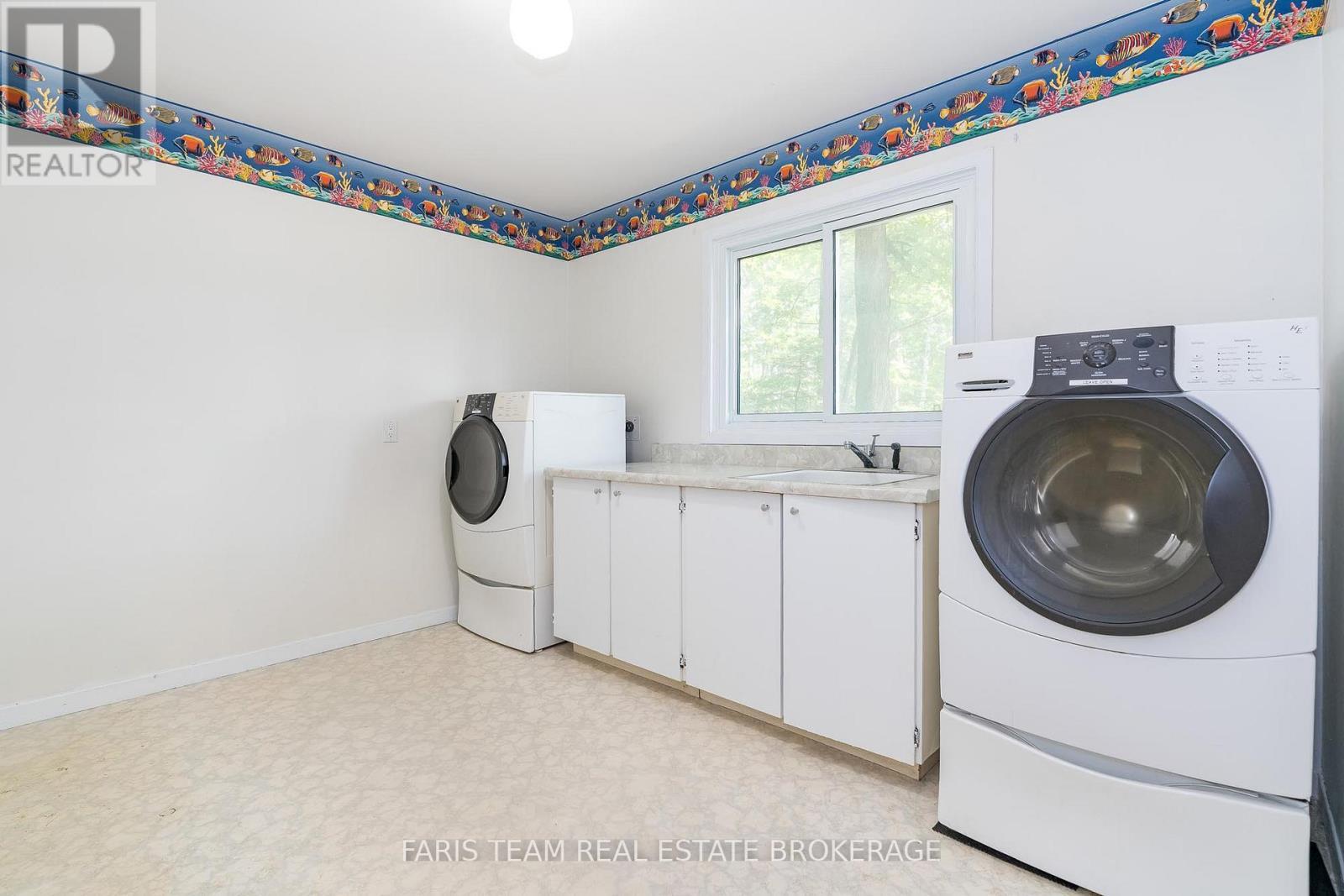 2597 George Johnston Road, Springwater, ON - Indoor Photo Showing Laundry Room