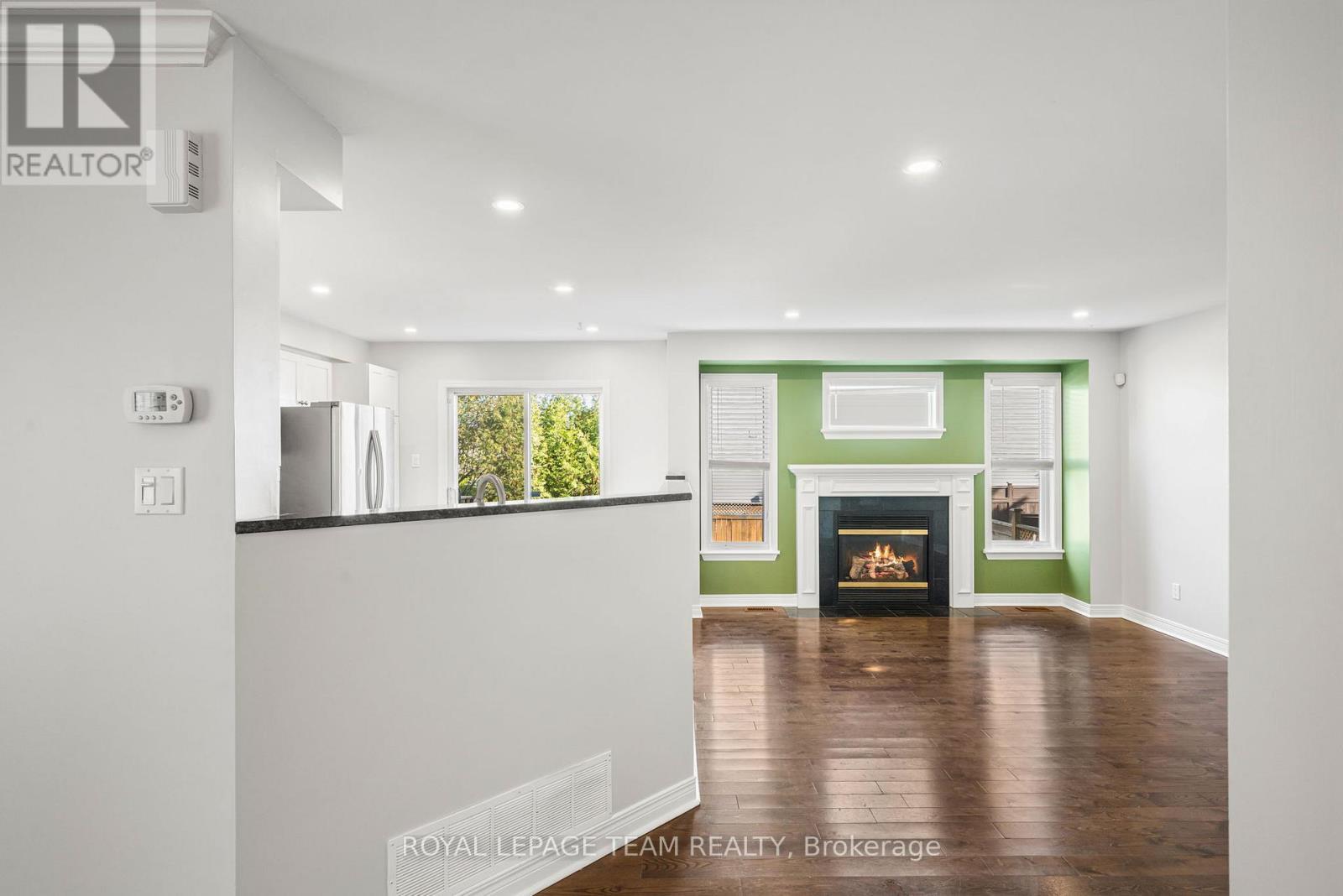 7 San Mateo Drive, Ottawa, ON - Indoor Photo Showing Other Room With Fireplace