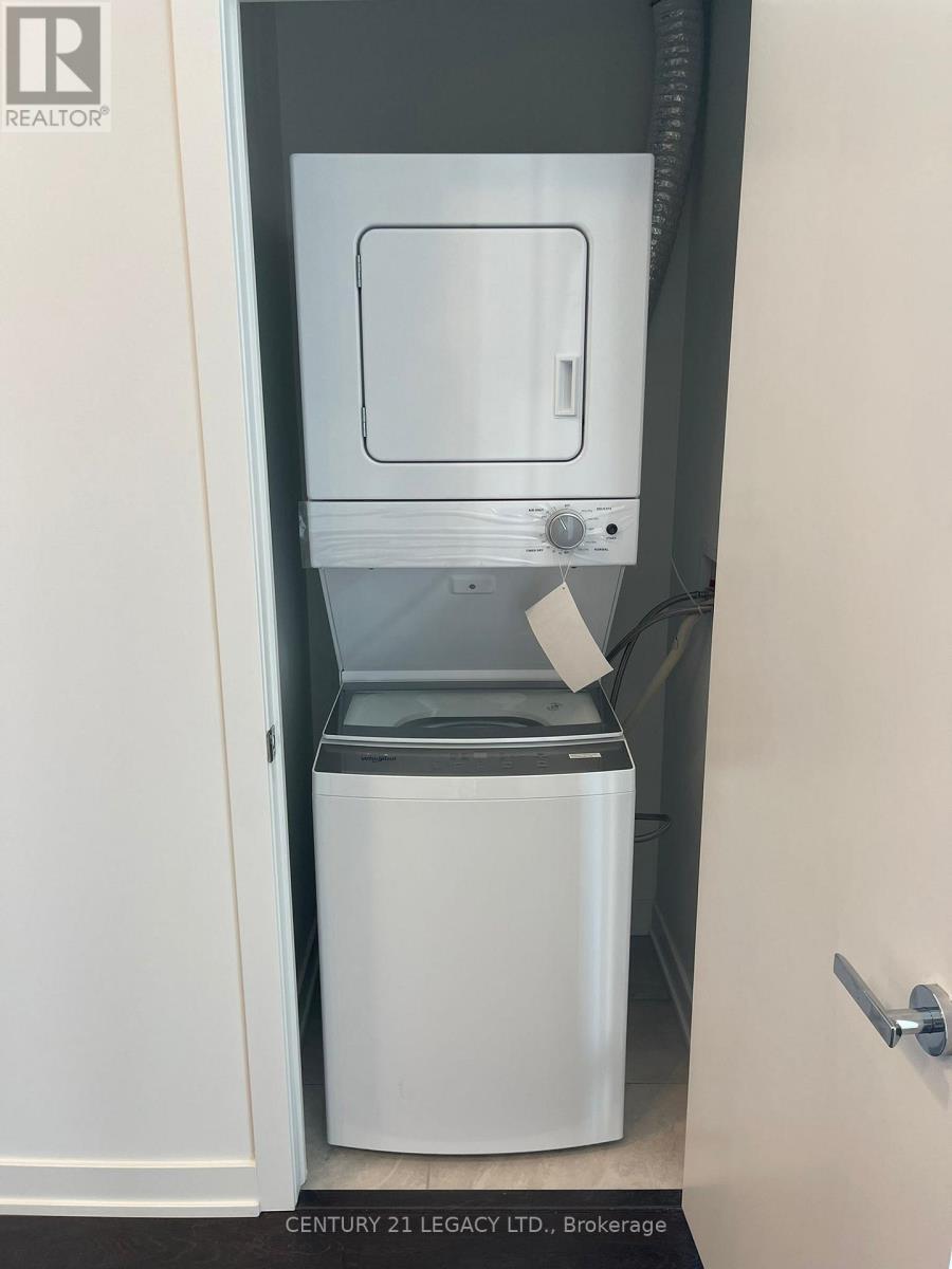 B1002 - 3200 Dakota Common, Burlington, ON - Indoor Photo Showing Laundry Room