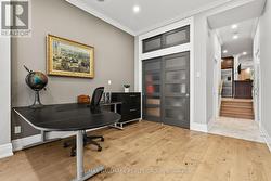 Custom hardwood floors & closet. -