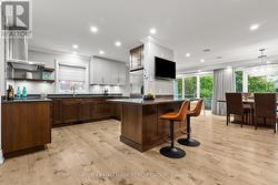 Open Concept KITCHEN with island. -