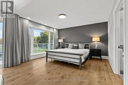 PRIMARY BEDROOM accomodates a king-sized bed. -