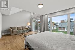 Lounge area in PRIMARY BEDROOM. -