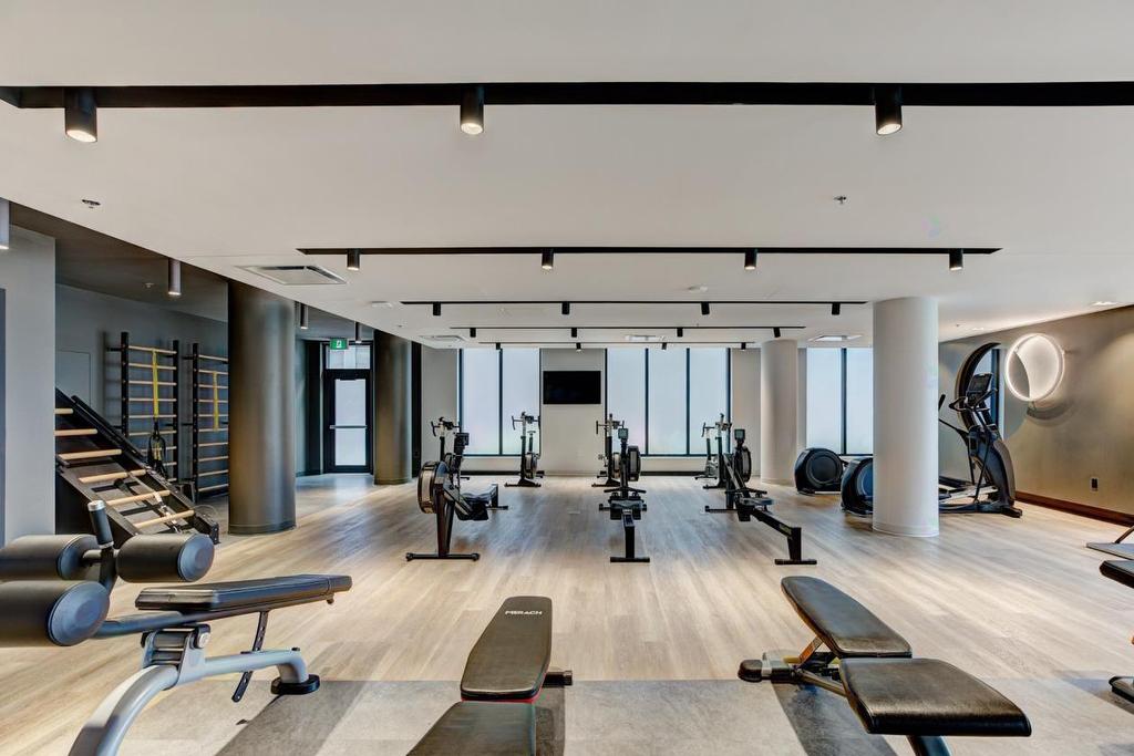- 413-505 Rue De L'Escale, Brossard, QC - Indoor Photo Showing Gym Room