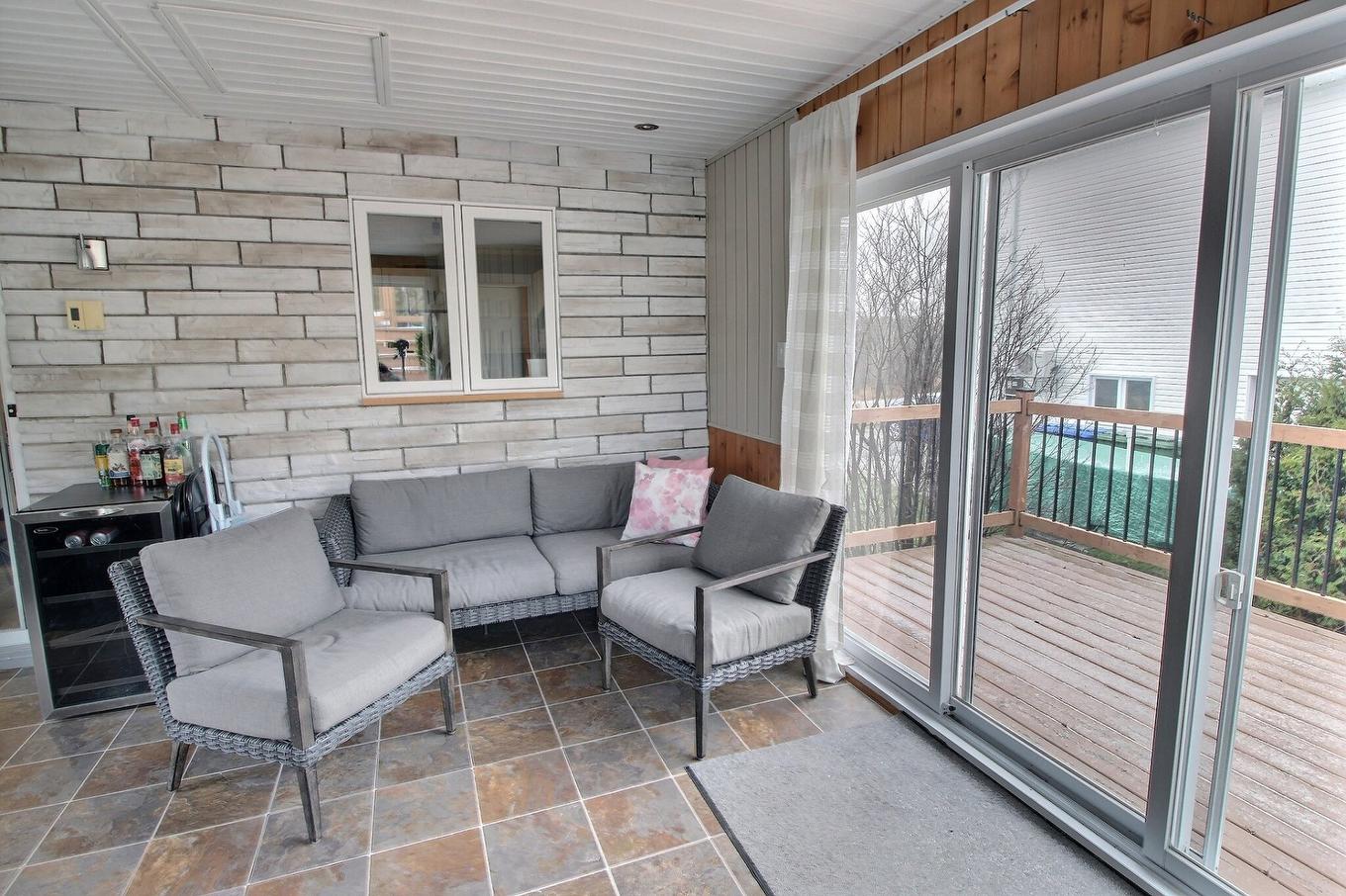 Solarium/Sunroom - 13 Rue Desjardins, Rouyn-Noranda, QC - With Deck Patio Veranda With Exterior