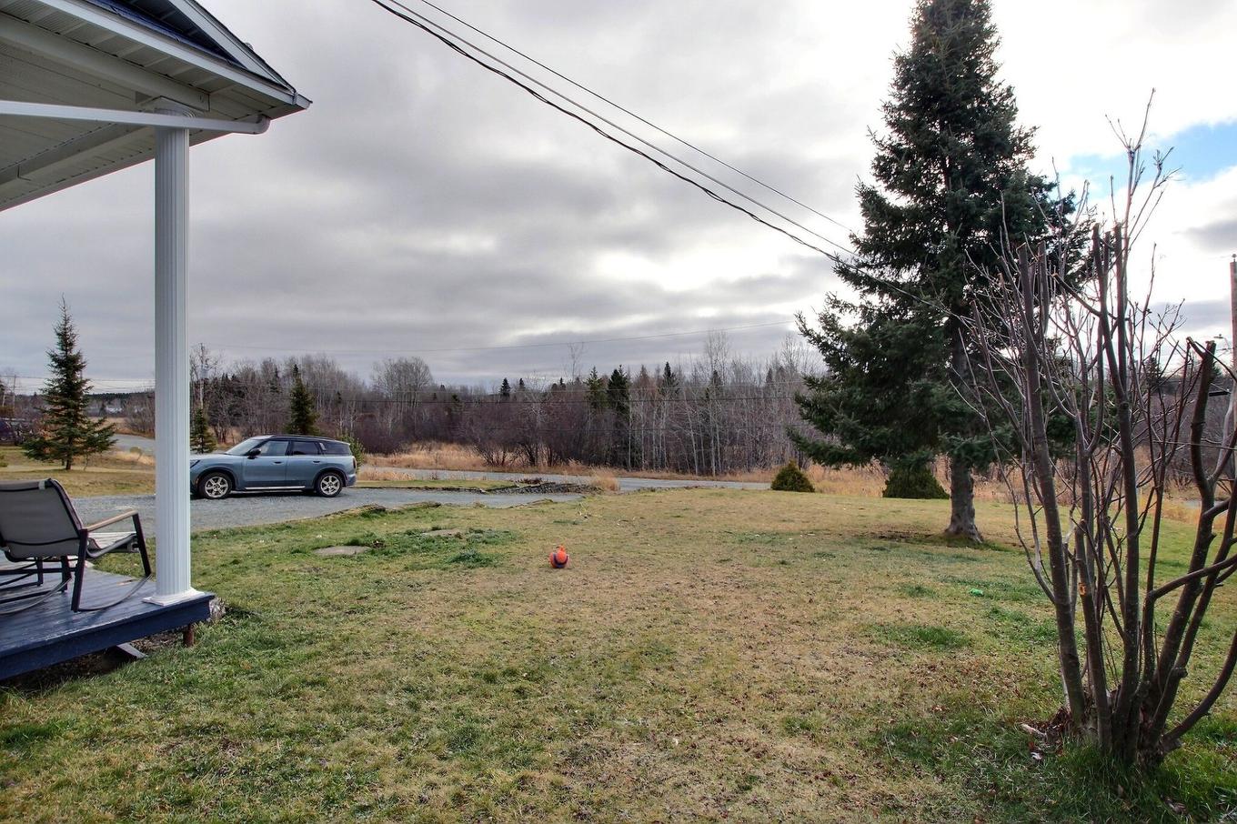 Backyard - 13 Rue Desjardins, Rouyn-Noranda, QC - Outdoor With View