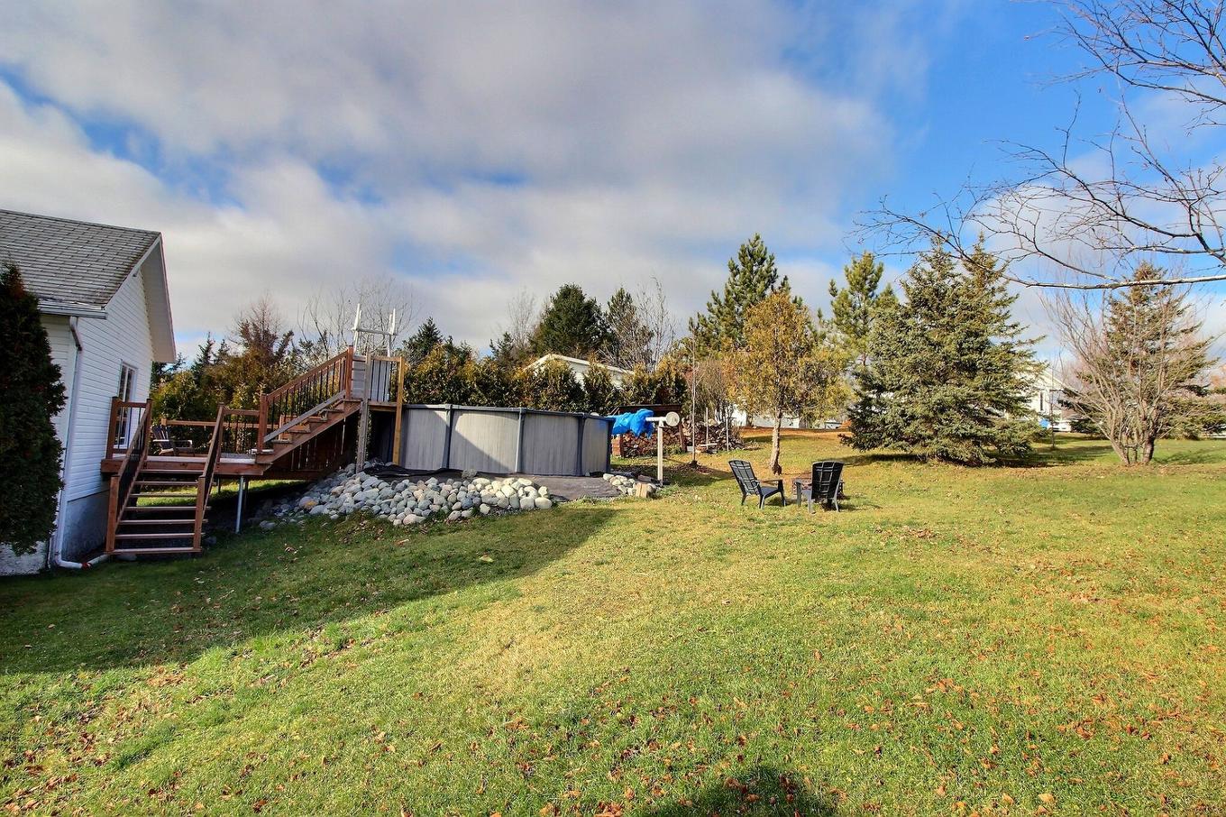 Backyard - 13 Rue Desjardins, Rouyn-Noranda, QC - Outdoor