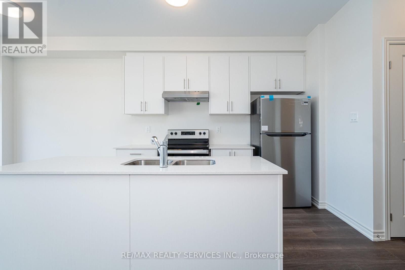 123 Sanderson Drive, Kawartha Lakes, ON - Indoor Photo Showing Kitchen With Stainless Steel Kitchen With Double Sink