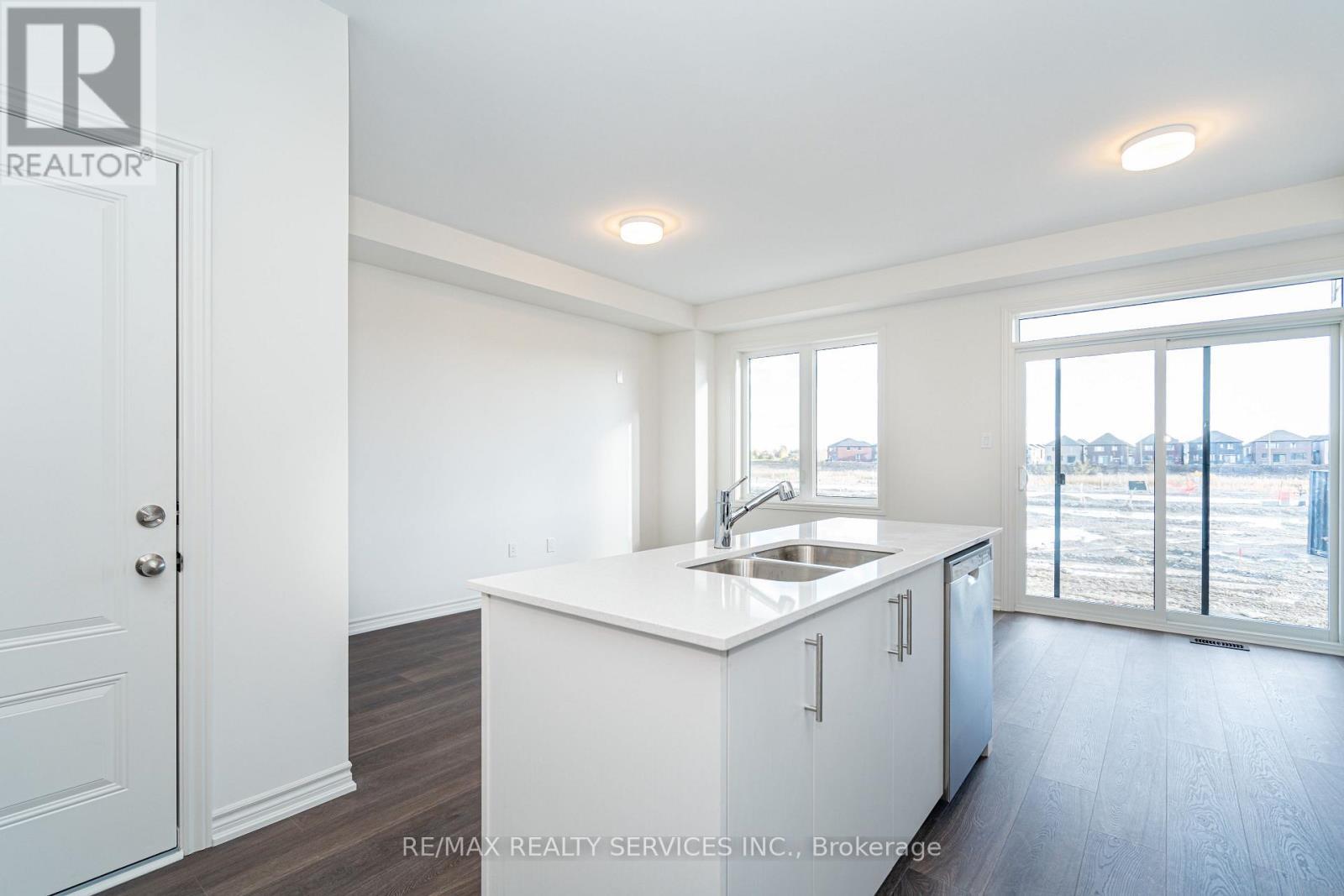 123 Sanderson Drive, Kawartha Lakes, ON - Indoor Photo Showing Kitchen With Double Sink