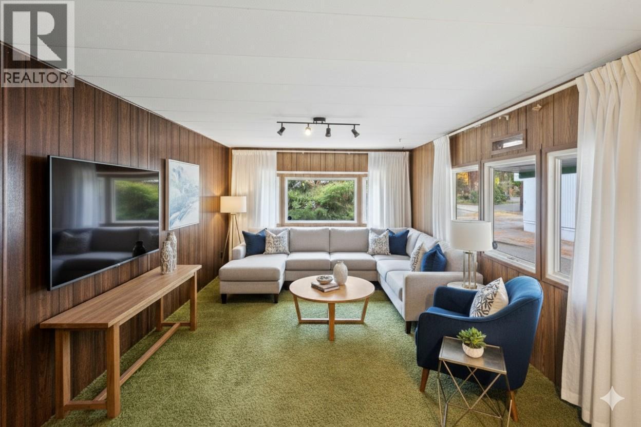 Living room digitally staged - 8487 Highway 97 Highway Unit# 6, Oliver, BC