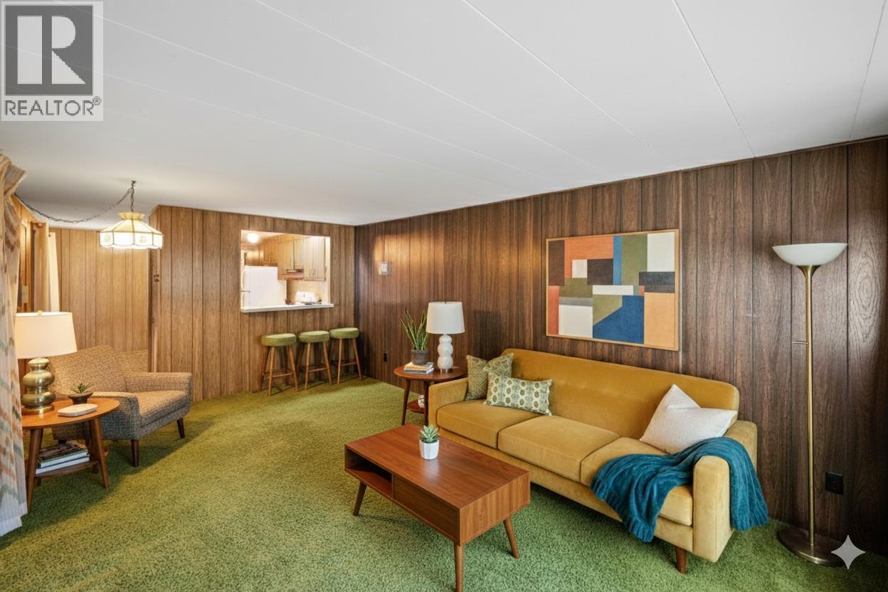 Living room digitally staged - 8487 Highway 97 Highway Unit# 6, Oliver, BC