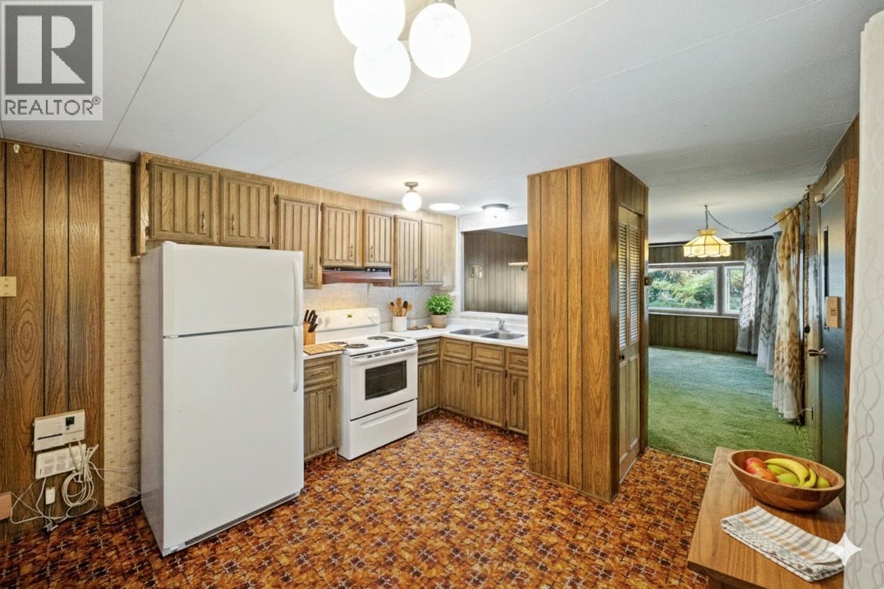 Kitchen digitally staged - 8487 Highway 97 Highway Unit# 6, Oliver, BC