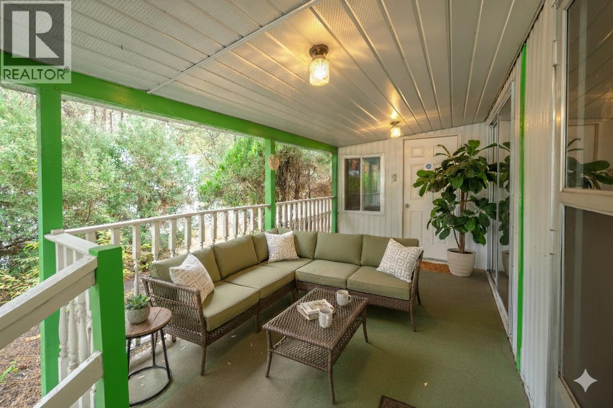 Deck digitally staged - 8487 Highway 97 Highway Unit# 6, Oliver, BC