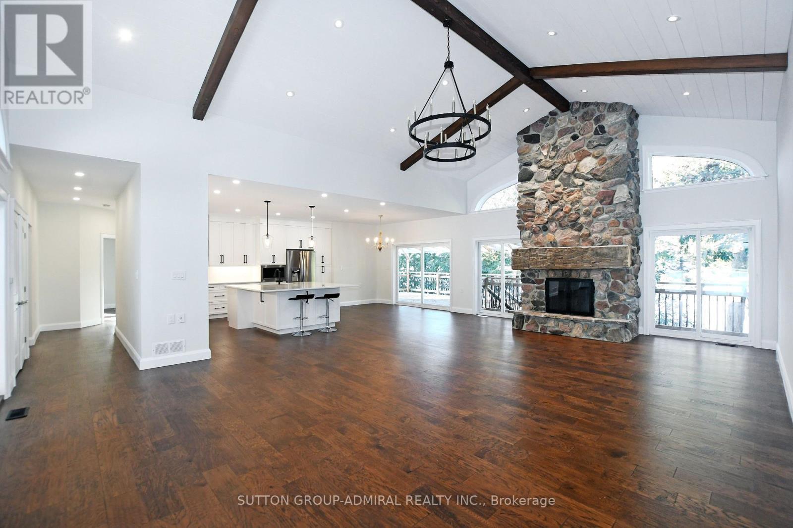 308 Indian Point Road, Kawartha Lakes, ON - Indoor Photo Showing Other Room With Fireplace
