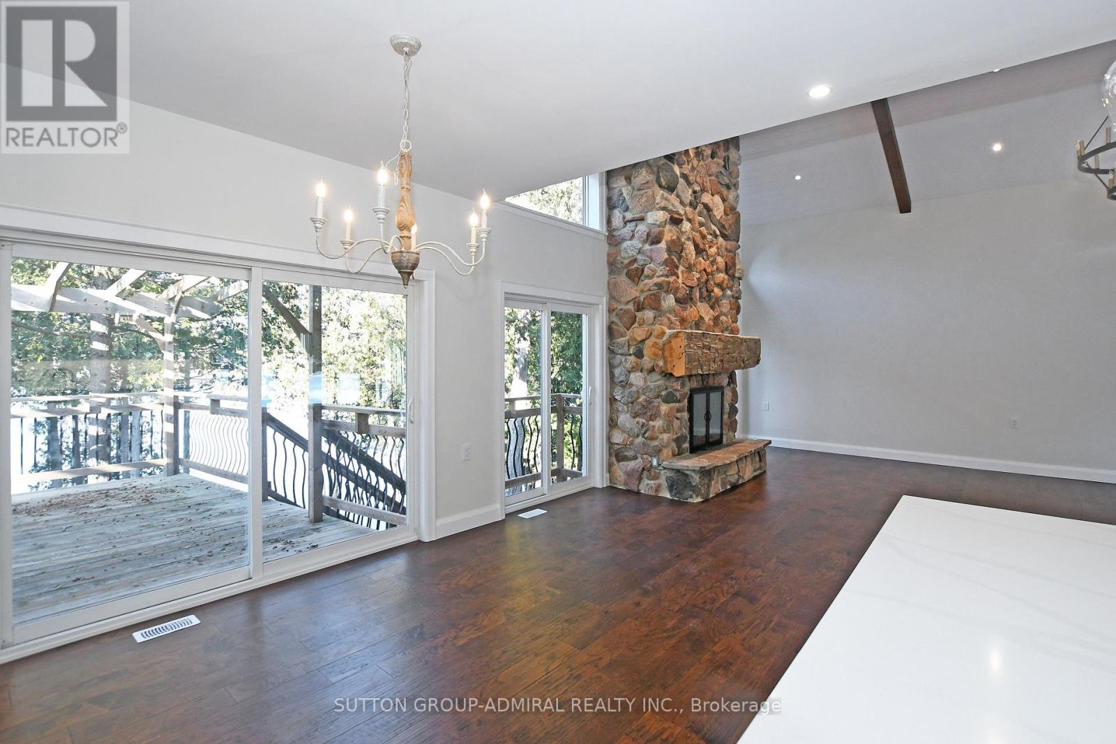308 Indian Point Road, Kawartha Lakes, ON - Indoor Photo Showing Other Room With Fireplace