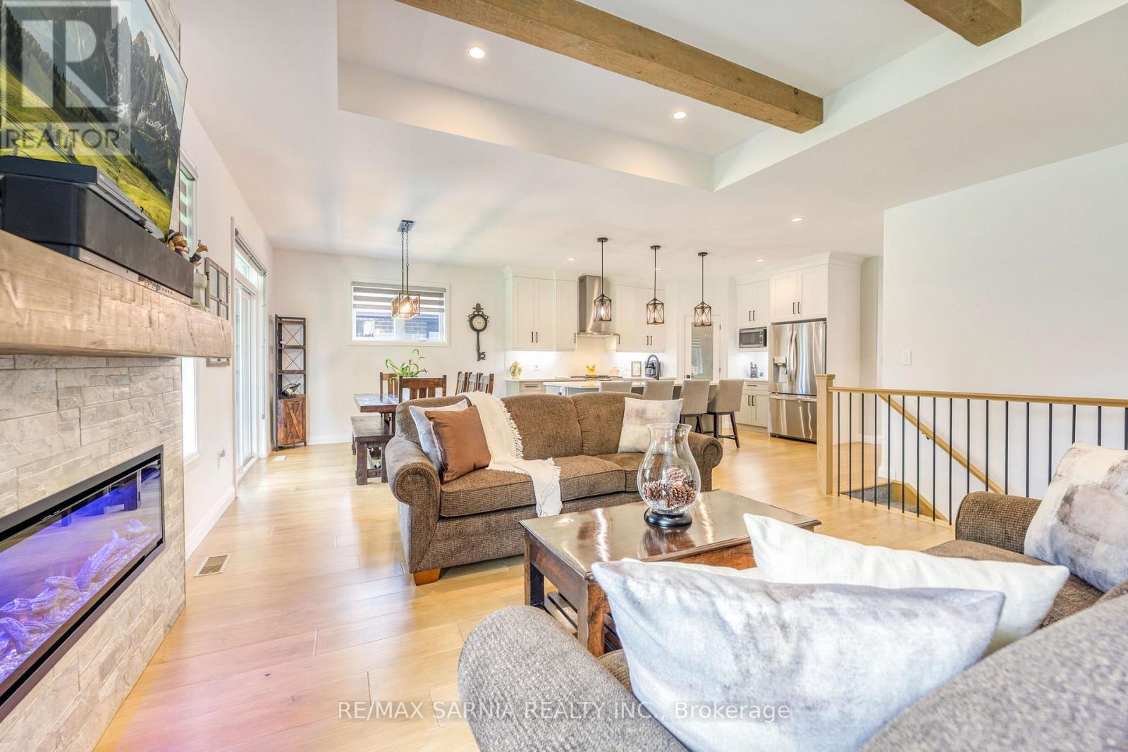 393 Bayhill Drive, St. Clair, ON - Indoor Photo Showing Living Room With Fireplace