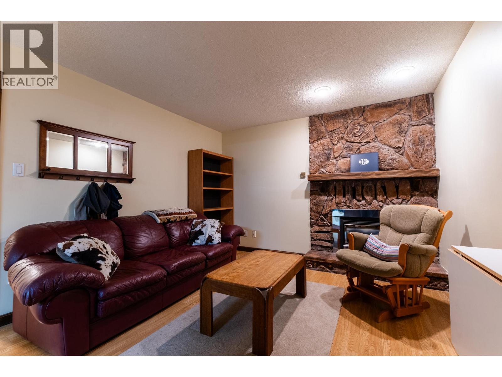 7742 St Mark Crescent, Prince George, BC - Indoor Photo Showing Living Room With Fireplace