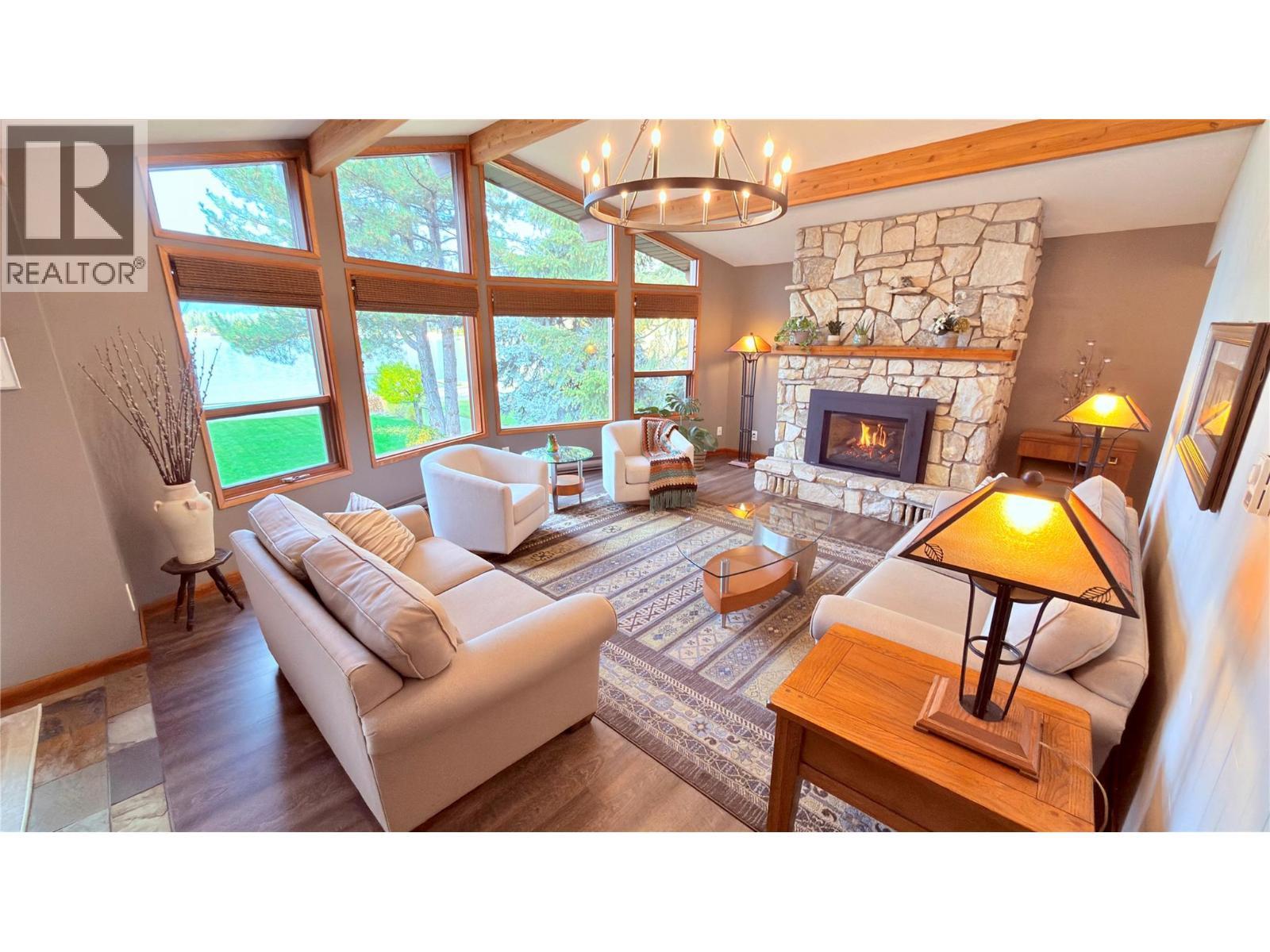 102 Sandner Road, Christina Lake, BC - Indoor Photo Showing Living Room With Fireplace