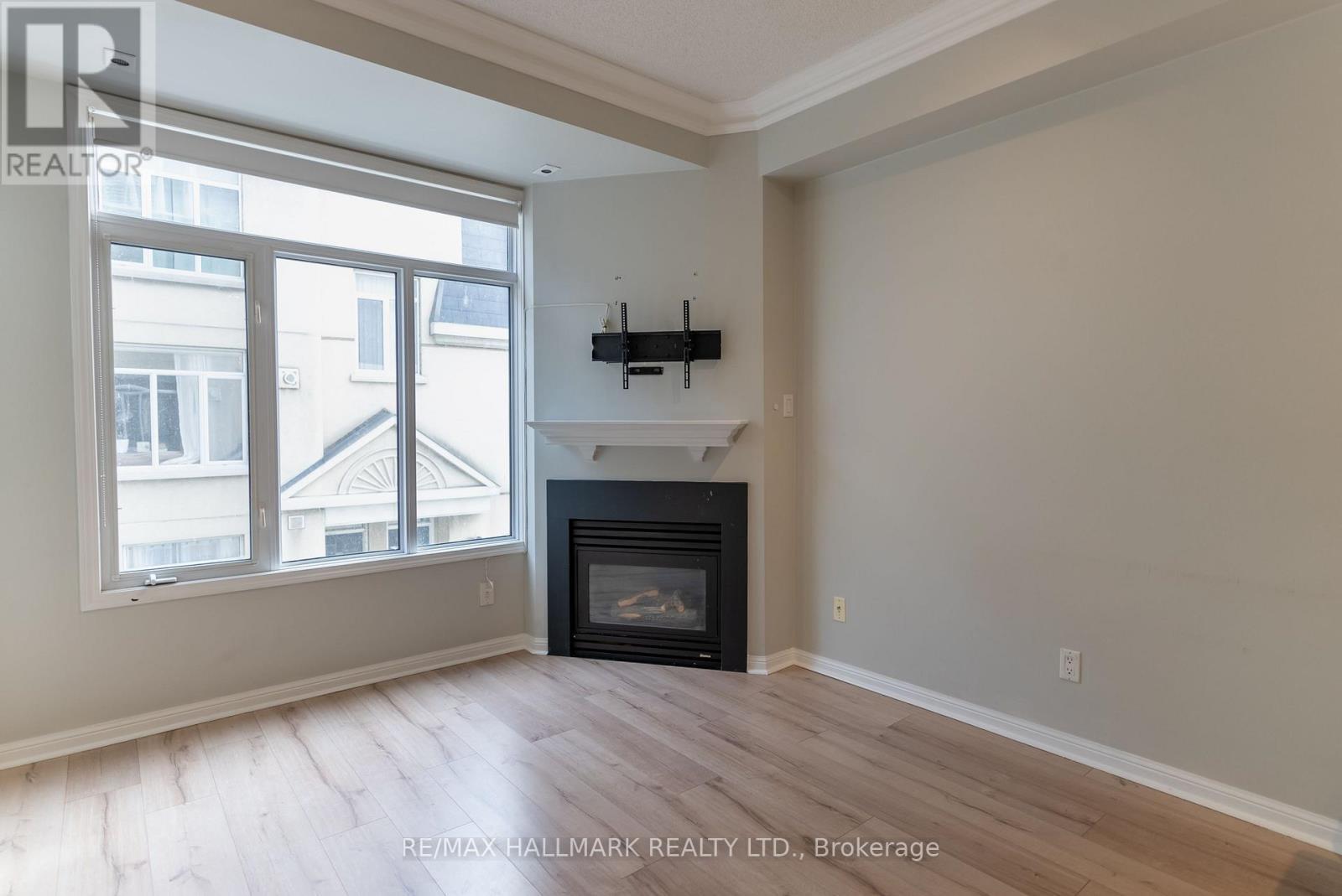 278 - 30 Stadium Road, Toronto, ON - Indoor Photo Showing Living Room With Fireplace