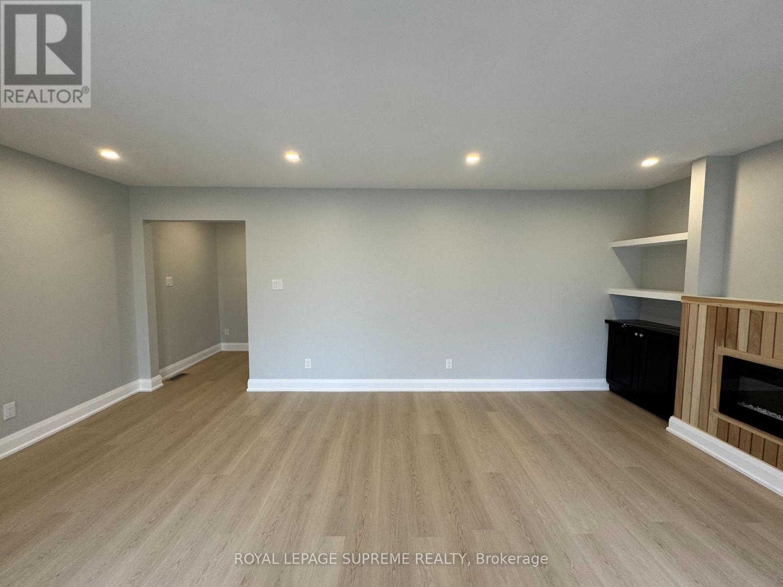 Upper - 8 Redwood Court, Barrie, ON - Indoor With Fireplace