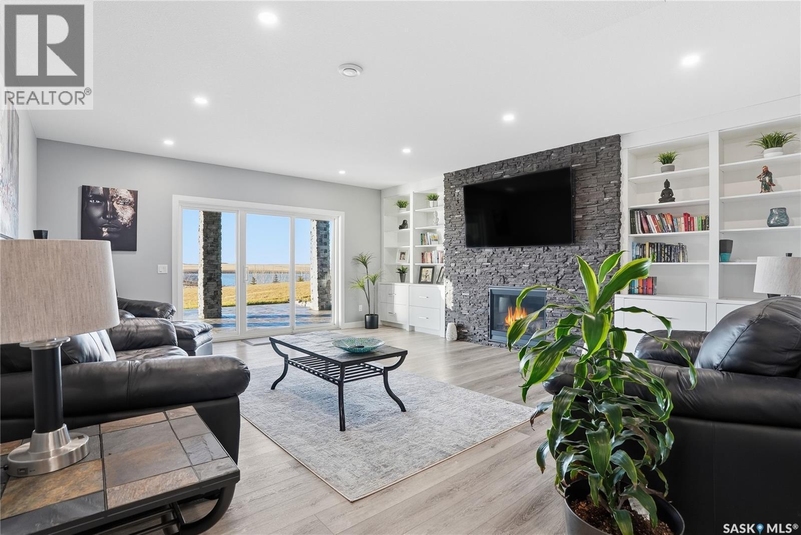 Toye Acreage, Grant Rm No. 372, SK - Indoor Photo Showing Living Room With Fireplace