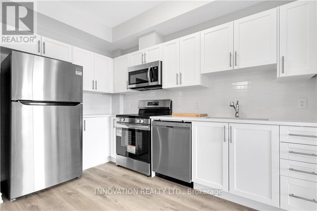 303 - 397 Codd'S Road, Ottawa, ON - Indoor Photo Showing Kitchen