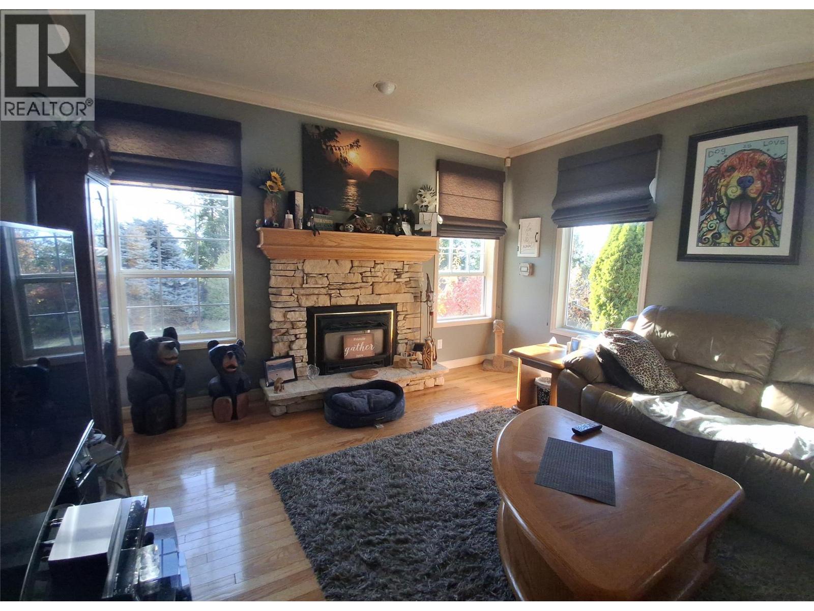 3267 Roncastle Road, Blind Bay, BC - Indoor Photo Showing Living Room With Fireplace