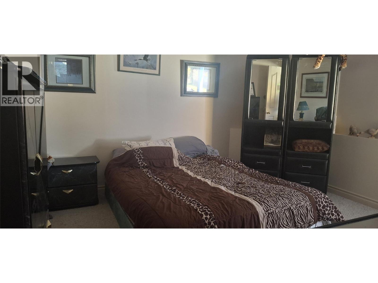 3267 Roncastle Road, Blind Bay, BC - Indoor Photo Showing Bedroom