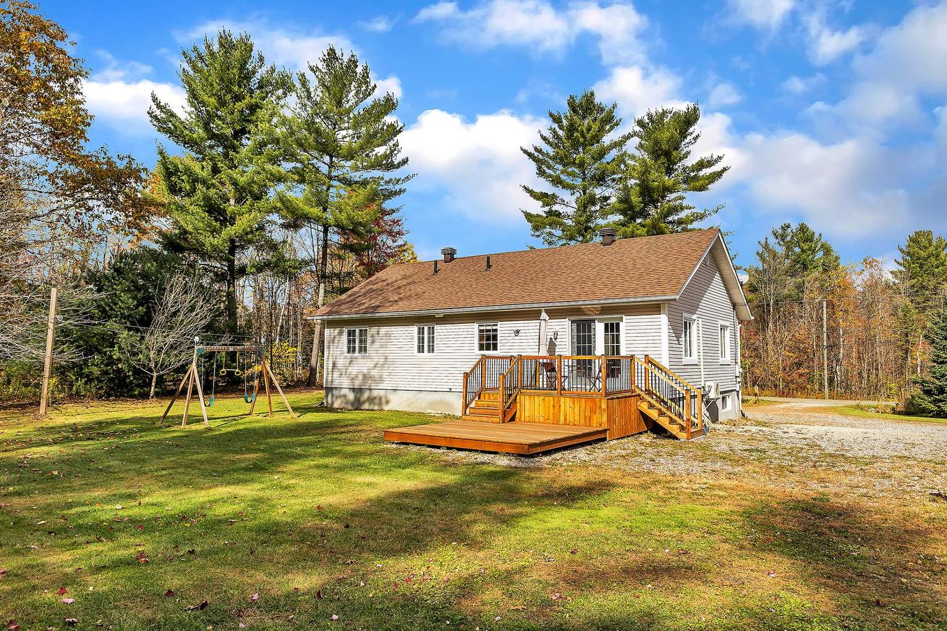 Back facade - 11 Rue Trésor, Val-Des-Monts, QC - Outdoor With Deck Patio Veranda
