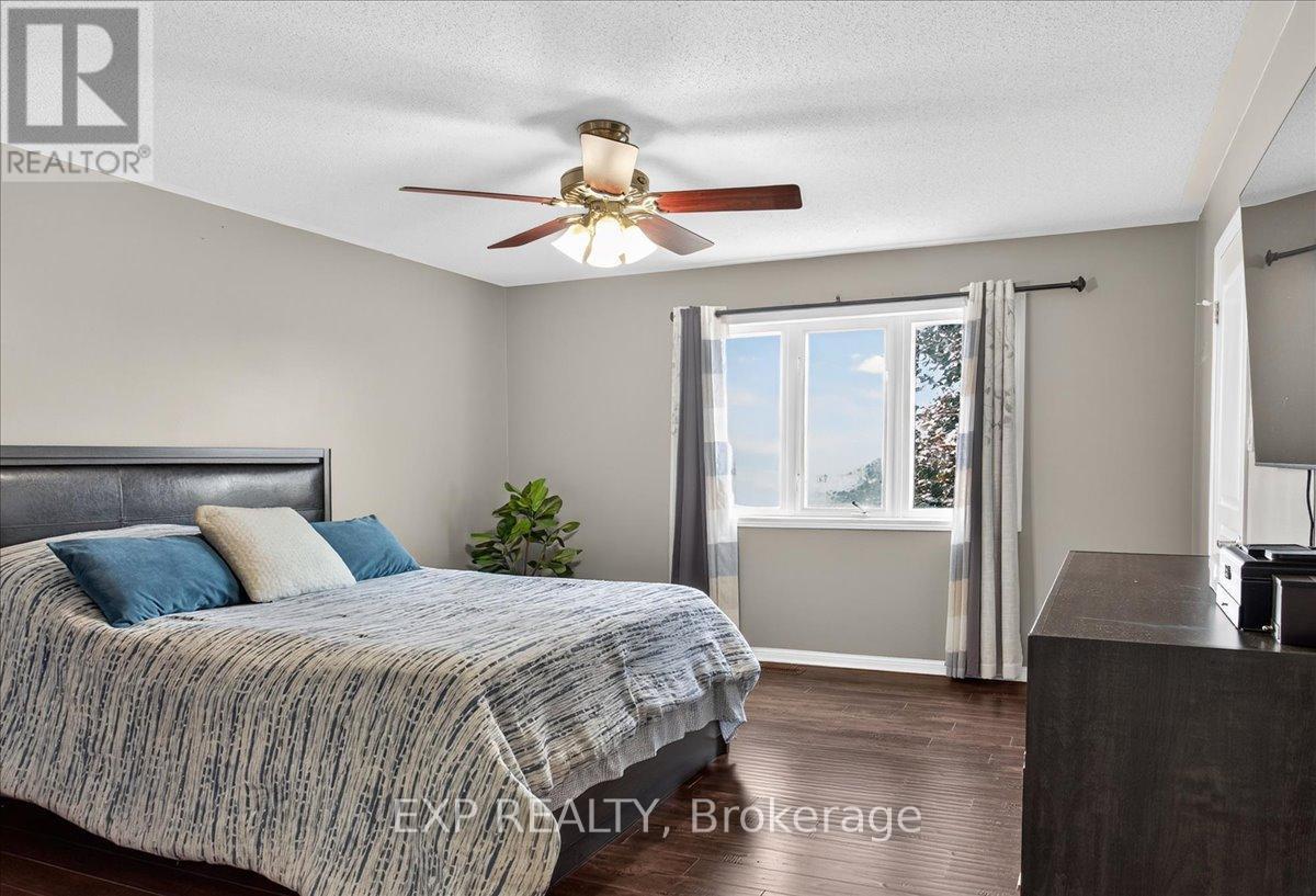 Primary Bed w/ Walk in Closet - 38 John W Taylor Avenue, New Tecumseth, ON - Indoor Photo Showing Bedroom