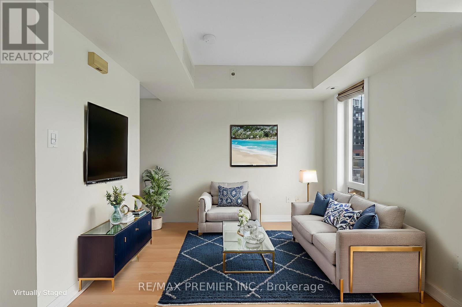 2704 - 27 Sudbury Street, Toronto, ON - Indoor Photo Showing Living Room
