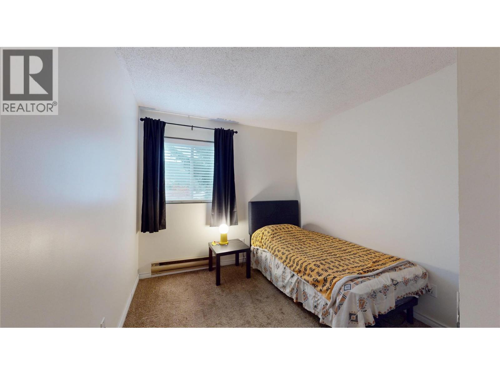 101A 1335 Alpine Drive, Elkford, BC - Indoor Photo Showing Bedroom