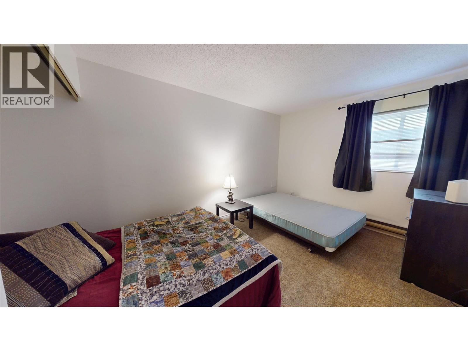 101A 1335 Alpine Drive, Elkford, BC - Indoor Photo Showing Bedroom