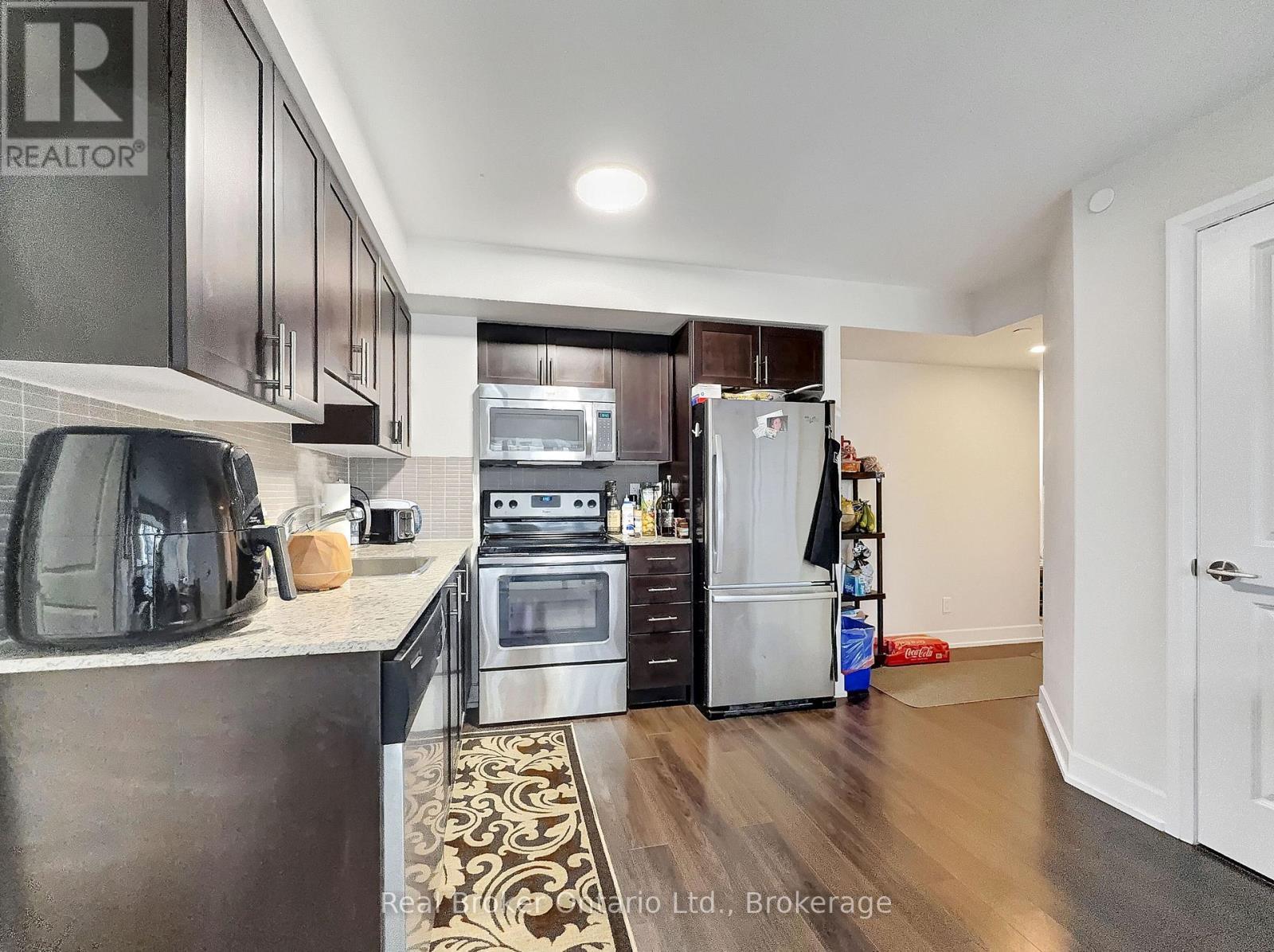 1724 - 2 Eva Road, Toronto (Etobicoke West Mall), ON - Indoor Photo Showing Kitchen With Stainless Steel Kitchen