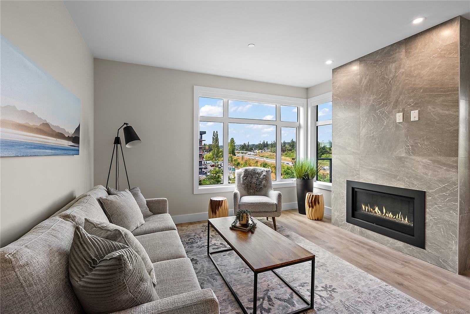 201-2520 Hackett Cres, Central Saanich, BC - Indoor Photo Showing Living Room With Fireplace